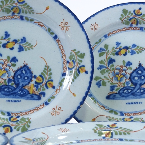 224 - A set of 5 19th century Continental faience pottery plates with hand painted decoration, diameter 23... 