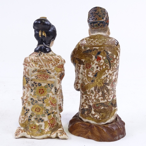 229 - A pair of Japanese Meiji Period gilded porcelain standing figures, one on hardwood stand, height 13c... 