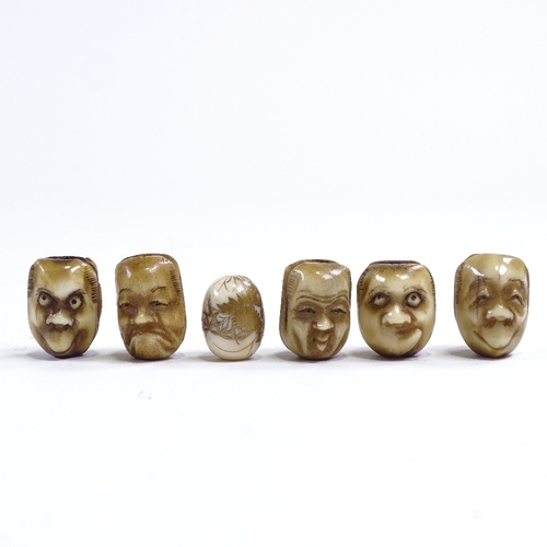 245 - A group of 5 Japanese staghorn ojime beads, circa 1900, depicting grotesque faces, length 18mm, and ... 