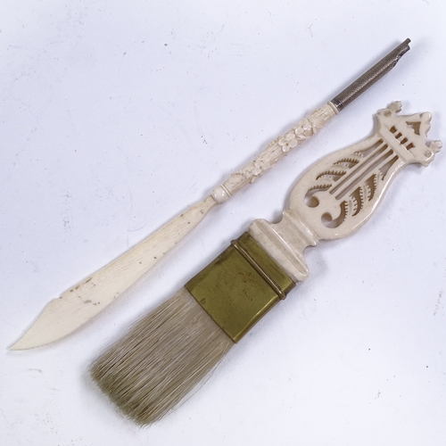 248 - A 19th century carved ivory dip pen with paper knife handle, and a carved and pierced bone stringed ... 