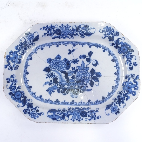 270 - An 18th century Delft blue and white pottery meat plate, hand painted floral decoration, 42cm x 31cm