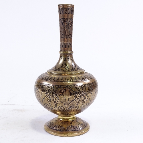 271 - A 19th century Islamic engraved bronze and black enamel water flagon, height 25cm