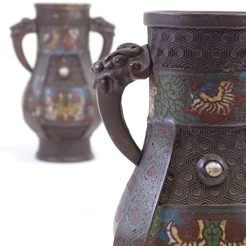 272 - A pair of Chinese bronze and champleve enamel vases with beast design handles, height 18.5cm