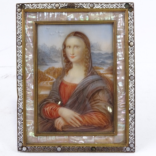 277 - Watercolour on ivory, after Leonardo, The Mona Lisa, unsigned, in mother-of-pearl inset brass filigr... 