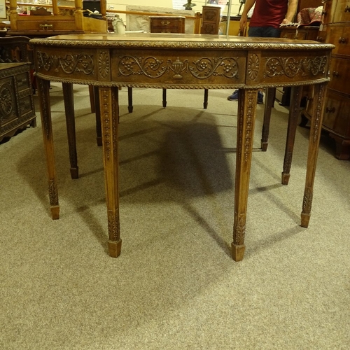 280 - A large 19th century Anglo-Indian padouk wood 4-section D-end dining table, with leaf carved edge an... 