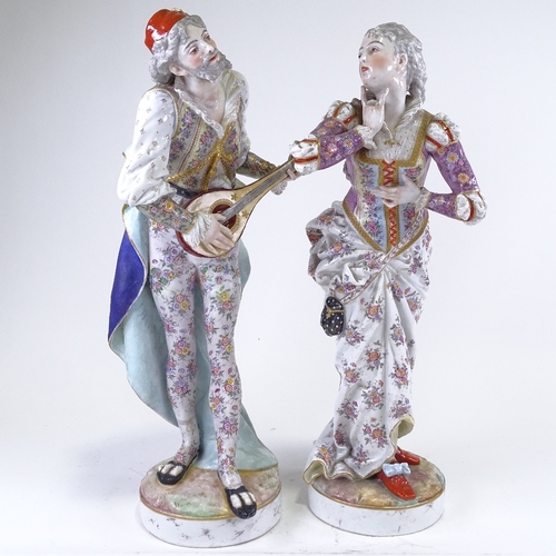 291 - A pair of 19th century Continental porcelain figures, minstrel and lady, transfer anchor marks under... 