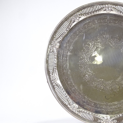 292 - A large circular electroplate tray, with pierced and embossed surround, diameter 53cm