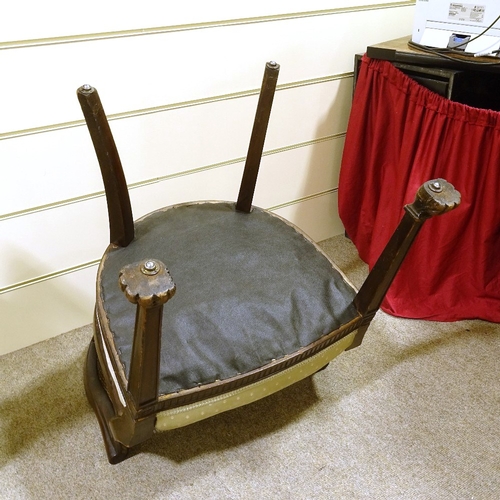 293 - A pair of early 20th century mahogany-framed bergere tub chairs, with cane-panelled backs and carved... 