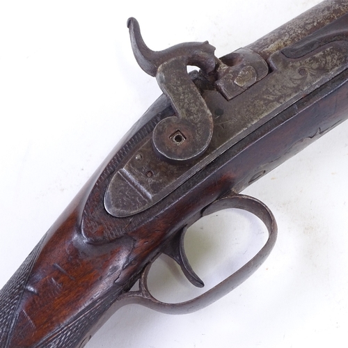 295 - A 19th century percussion sporting gun with carved mahogany stock, barrel length 80cm