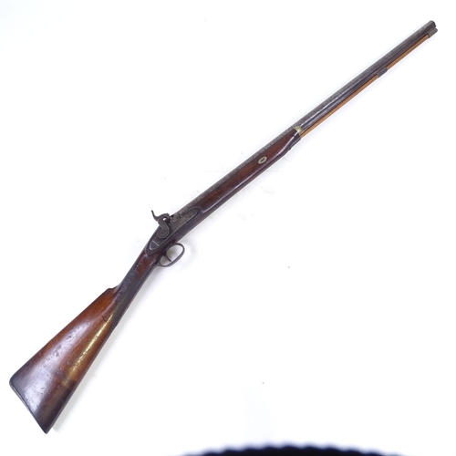 295 - A 19th century percussion sporting gun with carved mahogany stock, barrel length 80cm