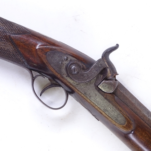 296 - A 19th century percussion sporting gun with carved mahogany stock, barrel length 71cm