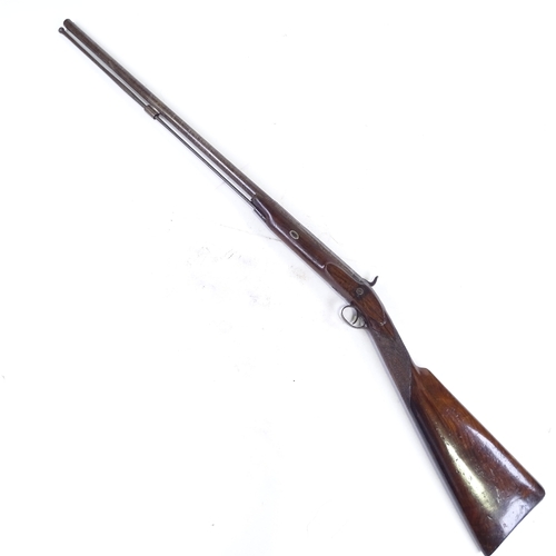 296 - A 19th century percussion sporting gun with carved mahogany stock, barrel length 71cm