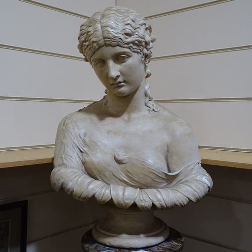 299 - A hollow-cast plaster bust of a Classical woman, on fluted stained wood pedestal, overall height 1.7... 