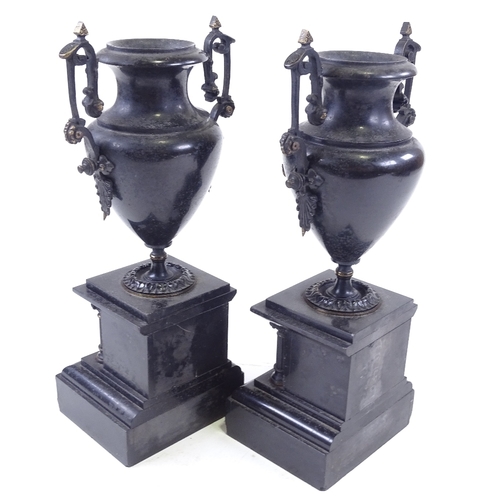 307 - A pair of Victorian slate and ormolu mounted mantel urns, height 35cm