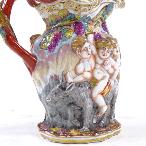 309 - An Italian Capodimonte porcelain wine jug, relief moulded Classical decoration, height 21cm