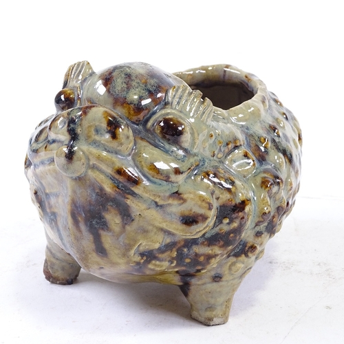 310 - A treacle glaze pottery grotesque animal, early 20th century, no factory marks, length 18cm