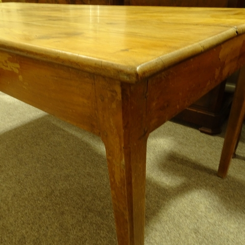 313 - A 19th century French fruitwood farmhouse dining table with plank top, single side frieze drawer and... 