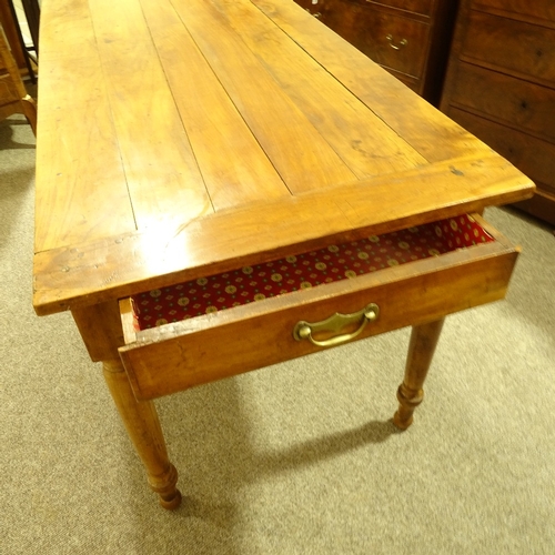 314 - A 19th century French cherrywood farmhouse dining table, 2 frieze drawers and turned legs, 1.55m x 7... 