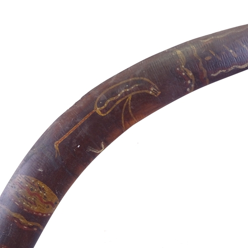 329 - An Australian Aboriginal stained wood boomerang, with painted Tribal designs and emu, late 19th or e... 