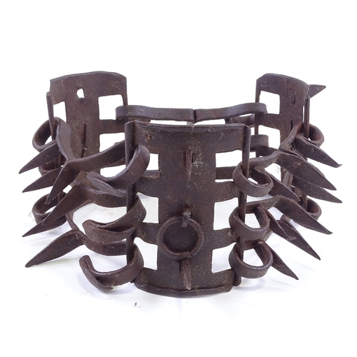 331 - A Victorian iron spiked dog collar, 9.5cm across