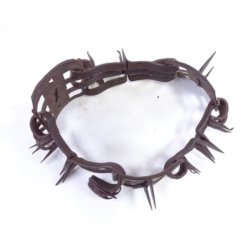 331 - A Victorian iron spiked dog collar, 9.5cm across