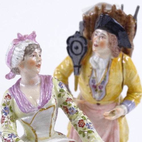 283 - A pair of 19th century German porcelain figures, depicting street vendors, blue underglazed marks, h... 