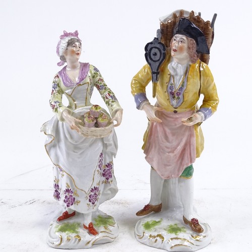 283 - A pair of 19th century German porcelain figures, depicting street vendors, blue underglazed marks, h... 