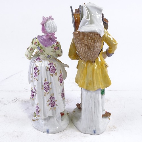 283 - A pair of 19th century German porcelain figures, depicting street vendors, blue underglazed marks, h... 