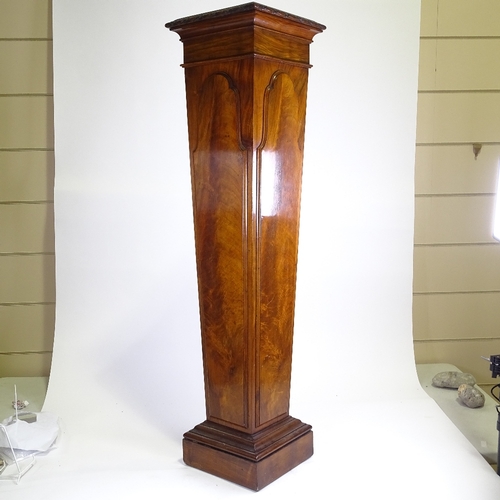 323 - An Edwardian figured mahogany pedestal, with carved leaf mouldings and relief panels, height 1.22m, ... 