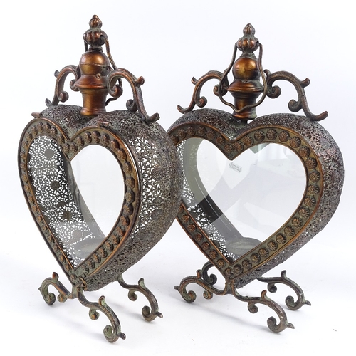 78 - A pair of modern copper double-sided heart-shaped candle lanterns, height excluding handle 46cm