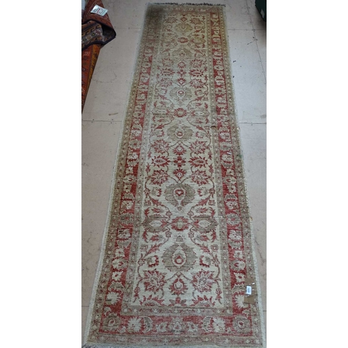 1855 - A cream ground Persian design runner, 305cm x 78cm