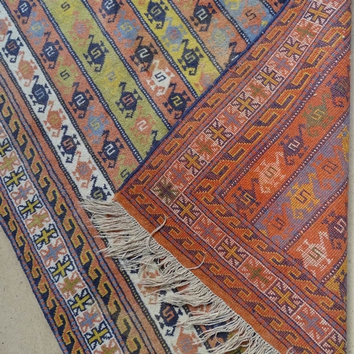 1856 - A blue ground Caucasian rug, 180cm