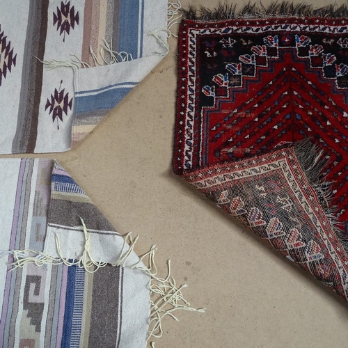 1857 - 2 similar flatweave Kilim rugs, and a small red ground Persian mat (3)