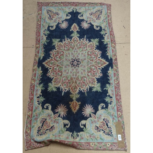 1858 - A Kashmiri chain stitch mat, 133cm x 73cm