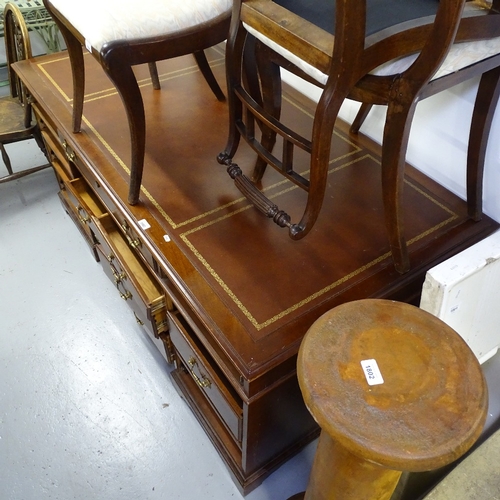 1803 - A large reproduction mahogany twin-pedestal writing desk, W173cm