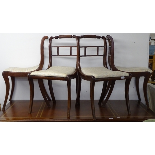 1804 - A set of 4 19th century mahogany sabre leg dining chairs