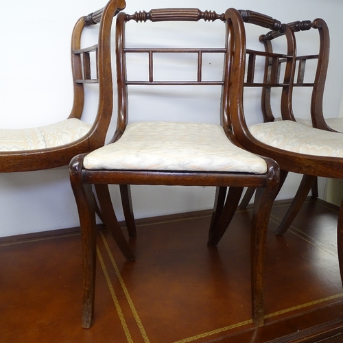 1804 - A set of 4 19th century mahogany sabre leg dining chairs