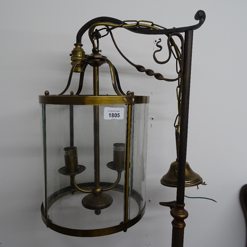 1805 - A brass-framed 2-branch lantern, on a telescopic cast-iron stand