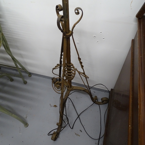 1805 - A brass-framed 2-branch lantern, on a telescopic cast-iron stand