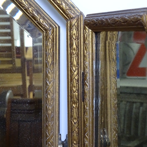 1814 - An Edwardian gilt-framed 3-fold dressing table mirror