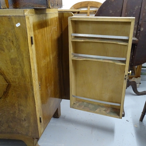 1824 - An Art Deco walnut sideboard/cocktail cabinet, with fold-out side and 2 panelled doors, L160cm