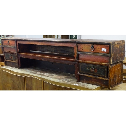 1825 - A pair of Chinese stained elm low 2-drawer shelves, L152cm