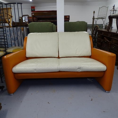 1832 - A contemporary design orange and white leather upholstered 2-seater settee, with adjustable backs, a... 