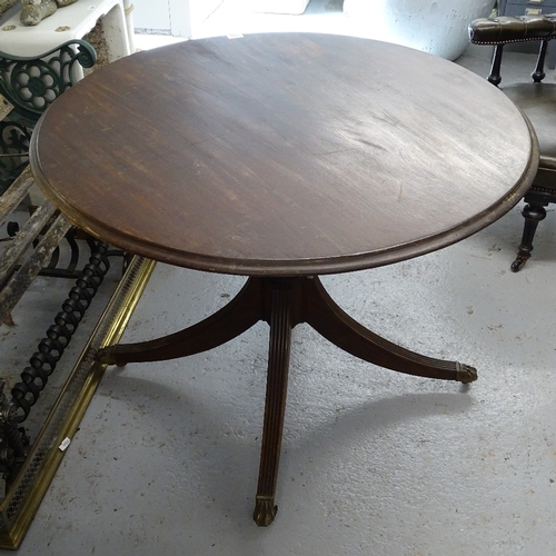 1834 - A circular mahogany breakfast table on quadruple base, 38