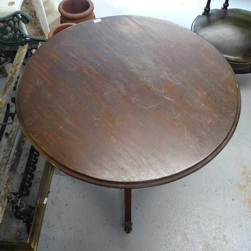 1834 - A circular mahogany breakfast table on quadruple base, 38