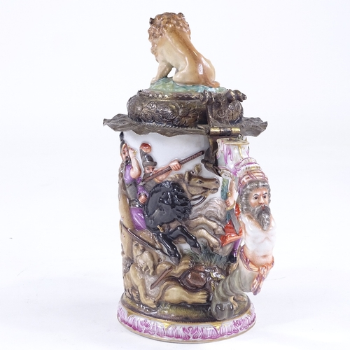 103 - A Capodimonte porcelain tankard, relief moulded Classical battle scene decoration surmounted by a li... 