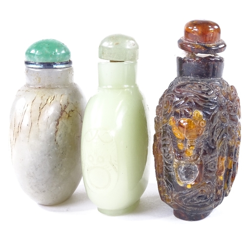 108 - A group of Chinese snuff bottles, including relief carved amber, and mother-of-pearl inlaid lacquer ... 