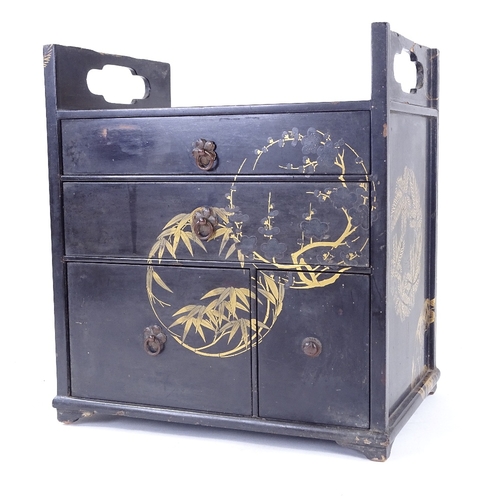 110 - A Japanese gilded and lacquered kodansu cabinet, Meiji Period, fitted with 2 long and 2 short drawer... 