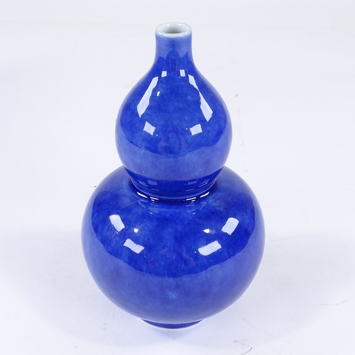 113 - A Chinese blue glaze porcelain double gourd vase, height 22cm