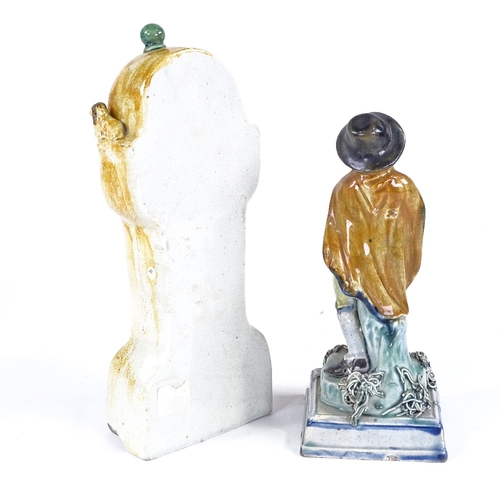 124 - A 19th century Pearlware pottery figure, man wearing a cloak, height 20cm, and a Pratt Ware pottery ... 